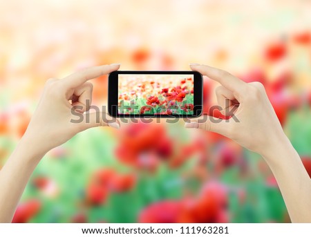 woman taking photo with mobile cell phone