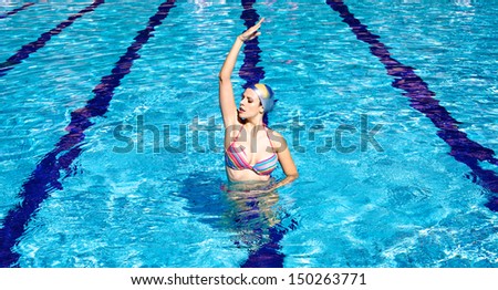 Perfect athlete trying sync swimming in pool