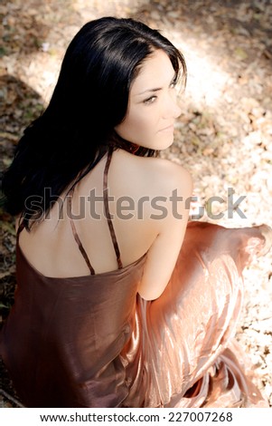 Gorgeous italian lady with green eyes and long black hair