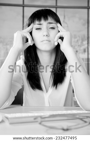 Young business woman feeling bad headache tired