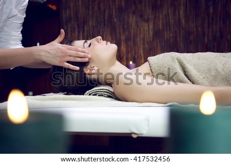Happy sleeping relaxing woman in spa