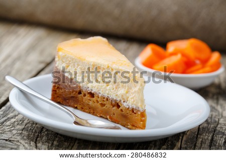 Slice of vegetarian carrot cake on white plate.