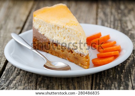 Slice of vegetarian carrot cake on white plate.