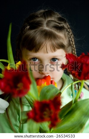 Stock photo: an image of a girl with a bunch of flowers