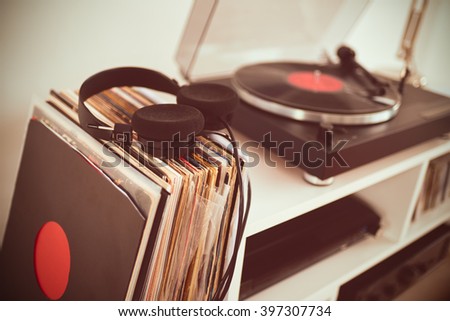 Analog Stereo Turntable Vinyl Record Player. Vinyl collection. Headphones