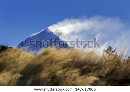 snow blowing over the top of Mount Cook at Mount Cook National Park, Canterbury, New Zealand
