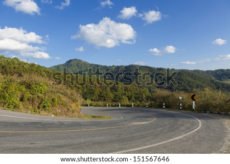 Asphalt road sharp curve on the mountain