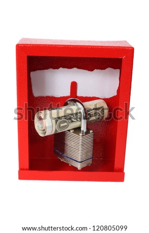 Currencies rolled up and pushed through a padlock standing in a red box with blank notice