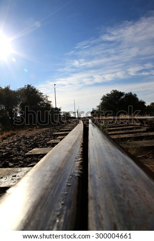 Railway tracks in a small town of Namibia.  Railway tracks change at the railway station.