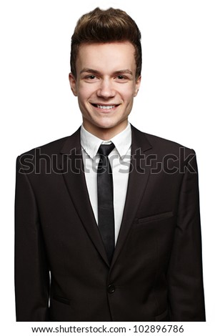 Handsome young businessman with a slight smile on his face