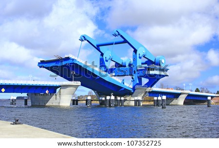 The stroke bridge of Wolgast connects the mainland with the island of Usedom crossing the Peene river near the mouth of the Baltic Sea