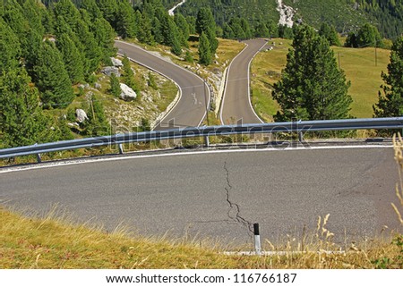 Road with many hairpin bends in the Italian Alps at Passo Sella