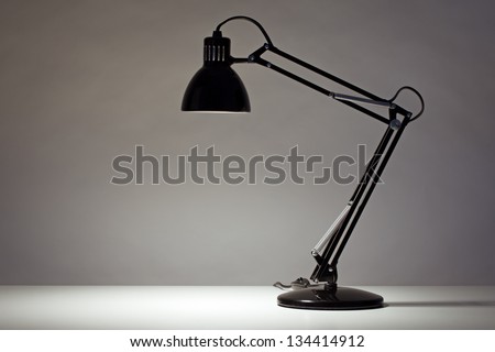 Black desk lamp isolated on white