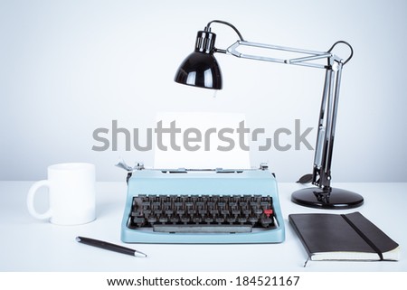 vintage typewriter and desk with lamp