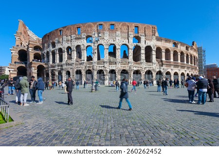 ROME, ITALY - MARCH 9, 2015: The Colosseum is an iconic symbol of Imperial Rome. It is one of Rome\'s most popular tourist attractions in Rome.