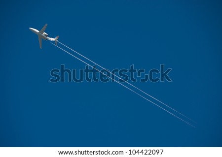 A private airplane producing Vapor trails