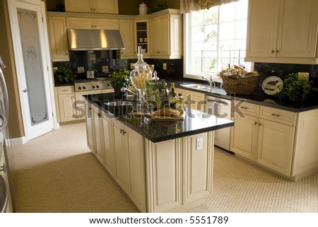 Kitchen with tile floor and island
