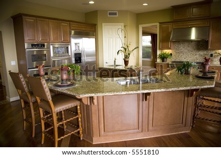Kitchen with tile floor and island