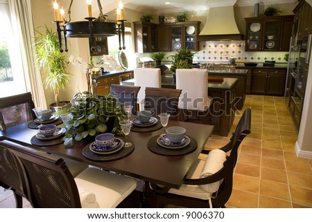 Dining table with luxury home kitchen.