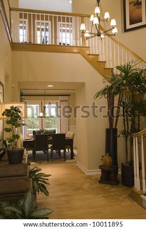 Luxury home hallway with wood floor.