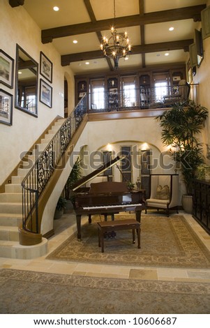 Grand piano in a spacious luxury home.