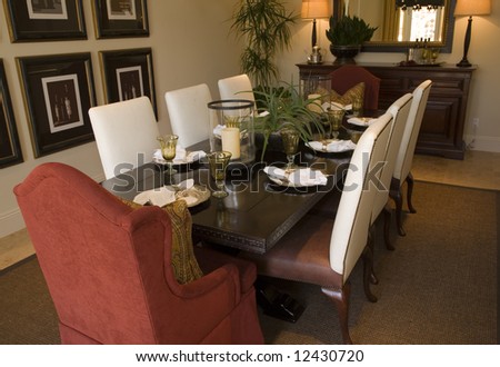 Luxury home dining table with exquisite tableware.