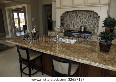 Designer kitchen with a granite island.