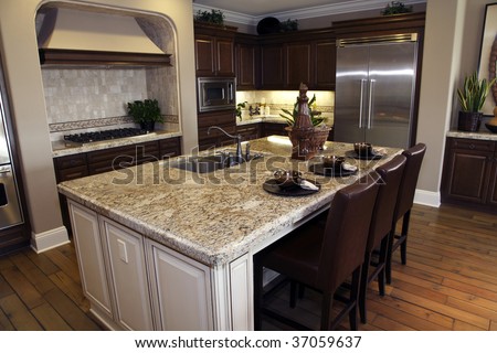 Luxury kitchen with a breakfast counter.