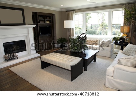 decorating a living room with a fireplace on Living Room With A Fireplace And Modern Decor  Stock Photo 40718812