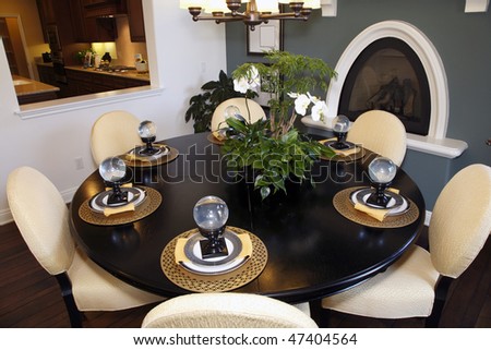 Luxury home dining table with stylish tableware.