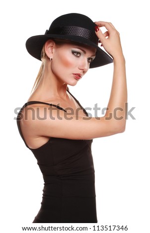 http://image.shutterstock.com/display_pic_with_logo/1030921/113517346/stock-photo-elegant-blonde-model-in-classic-black-dress-with-hat-on-the-white-background-113517346.jpg