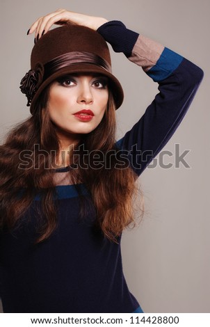 Brunette model in the knit dress