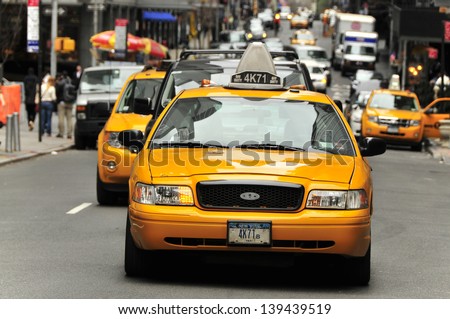 NEW YORK USA APRIL 11 Taxis in the traffic Manhattan April 11 2012 in New York City The city is planning to replace its fleet of various kinds of taxis with one model NEW YORK USA APRIL 11 Taxis in the traffic Manhattan April 11 2012 in New York City The city is planning to replace its fleet of various kinds of taxis with one model