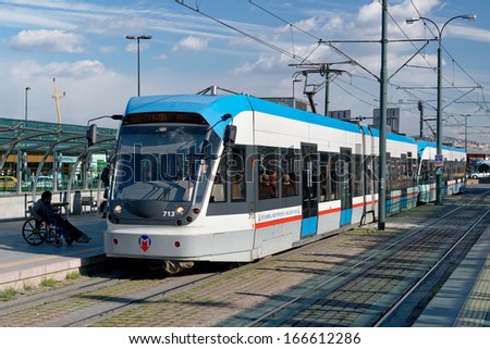 ISTANBUL - DECEMBER 8: A modern tram on Sirkeci on December 8, 2013 in Istanbul. Due to increasing traffic & air pollution, Istanbul became one of most polluted city also planned for return of tram.