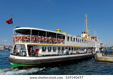Istanbul - June 9, 2013: People Get On Board The Ship At Eminonu On June 9, 2013 In Istanbul. Nearly 150,000 Passengers Use Ferries Daily In Istanbul, Due To Easy Access To Two Different Continents.