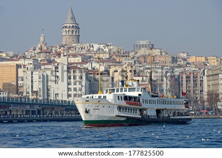 ISTANBUL TURKEY- JAN 12 Cruise ferries in Eminonu Port near Galata Tower and Galata Bridge on January 11 2014 in Istanbul Turkey The Eminonu waterfront is a major dock for ferryboats in Istanbul ISTANBUL TURKEY- JAN 12 Cruise ferries in Eminonu Port near Galata Tower and Galata Bridge on January 11 2014 in Istanbul Turkey The Eminonu waterfront is a major dock for ferryboats in Istanbul
