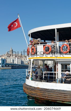 ISTANBUL - OCTOBER 20: People get on board the ship at Eminonu on October 20, 2013 in Istanbul. Nearly 150,000 passengers use ferries daily in Istanbul, due to easy access to two different continents.