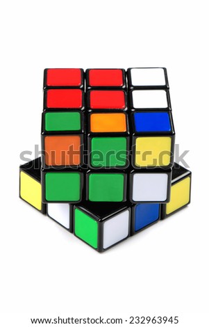 ISTANBUL- TURKEY - JULY 13, 2014: Rubik\'s cube on the white background. Rubik\'s Cube on a white background. Rubik\'s Cube invented by a Hungarian architect Erno Rubik in 1974.
