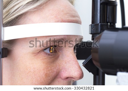 Eye examination at the slit lamp â?? Close up