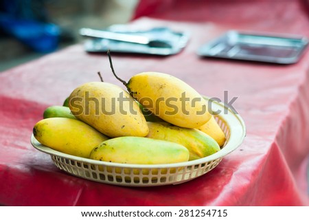 An Mango fruit in nature with soft light .