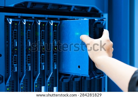 People fix server network in data room .