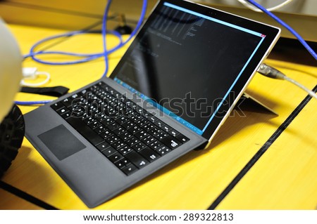 An Computer laptop in working room .