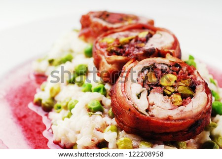 Bacon wrapped chicken leg with pork & pistachio served with risotto