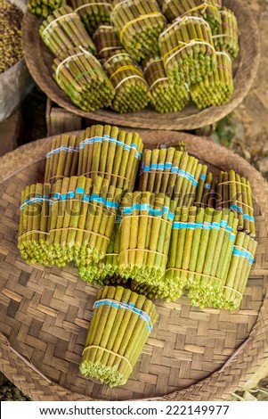 Tobacco rolled in leaves, sold on market in Myanmar (Burma)