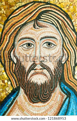 Mosaic: Christ\'s Face. The mosaic is modern, in byzantine style, made by a sicilian artist. It looks like the Blessing Christ in the Cappella Palatina in Palermo or the one in the Monreale Cathedral.