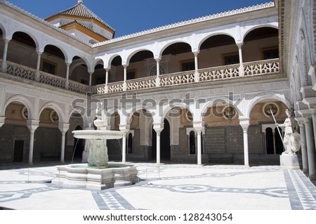 SEVILLE, SP  - JUNE 13: Patio Principal of La Casa De Pilatos, Seville In Spain. The building is a precious palace in mudejar spanish style. June 13, 2012 in Seville, Spain
