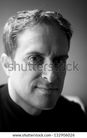 Portrait of a young man (35-40 years old). Black and White.