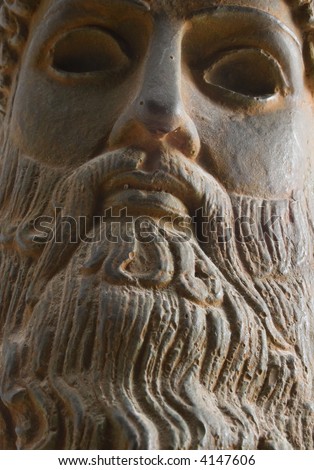 Ancient mythological Greek god Poseidon statue view from below
