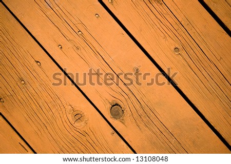 Stained wood deck background in angled pattern