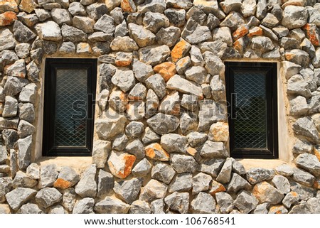window and rock wall